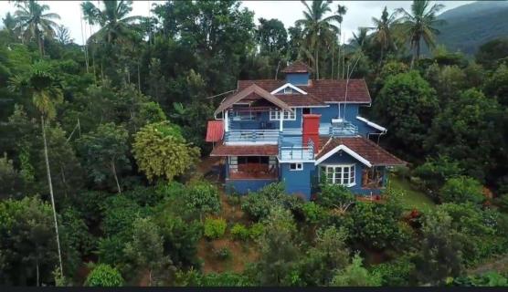 Experience Majestic Wayanad from Our Premier Homestay. logo