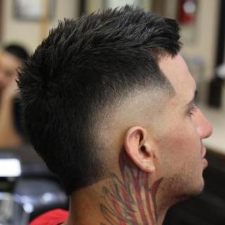 Straight Hair Burst Fade Mohawk logo