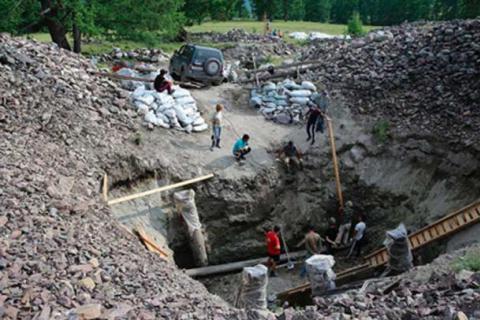 2,300 Year-Old Log Cabin Dug Out Of Permafrost Rebuilds Perfectly logo