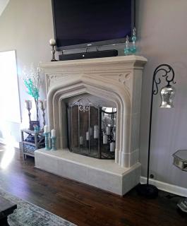 Enhance Your Fireplace with Elegant Cast Stone Mantels by Artistic Artisans LLC logo